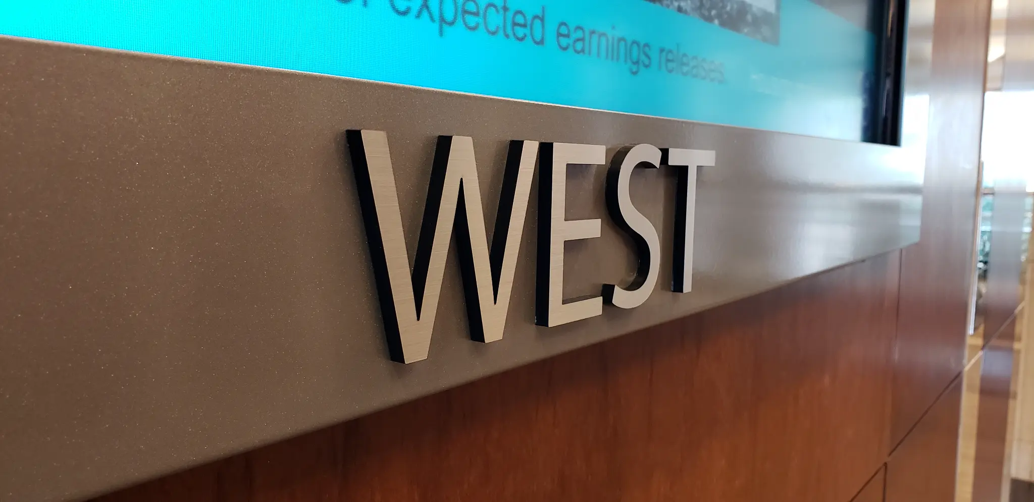 Close-up of WEST lettering on the Parkside Terrace digital directory frame