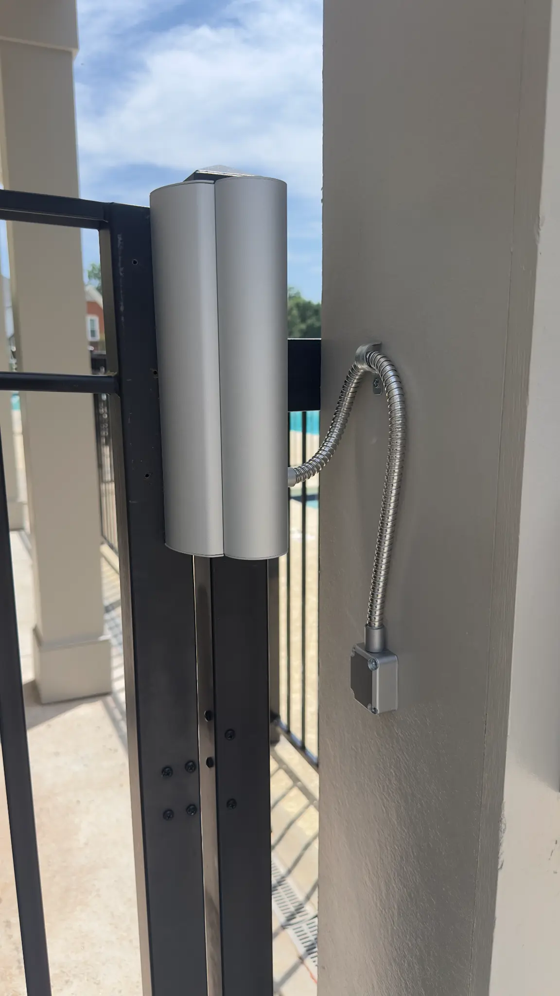 PDK access control reader mounted on TUXFORD HOA pedestrian gate